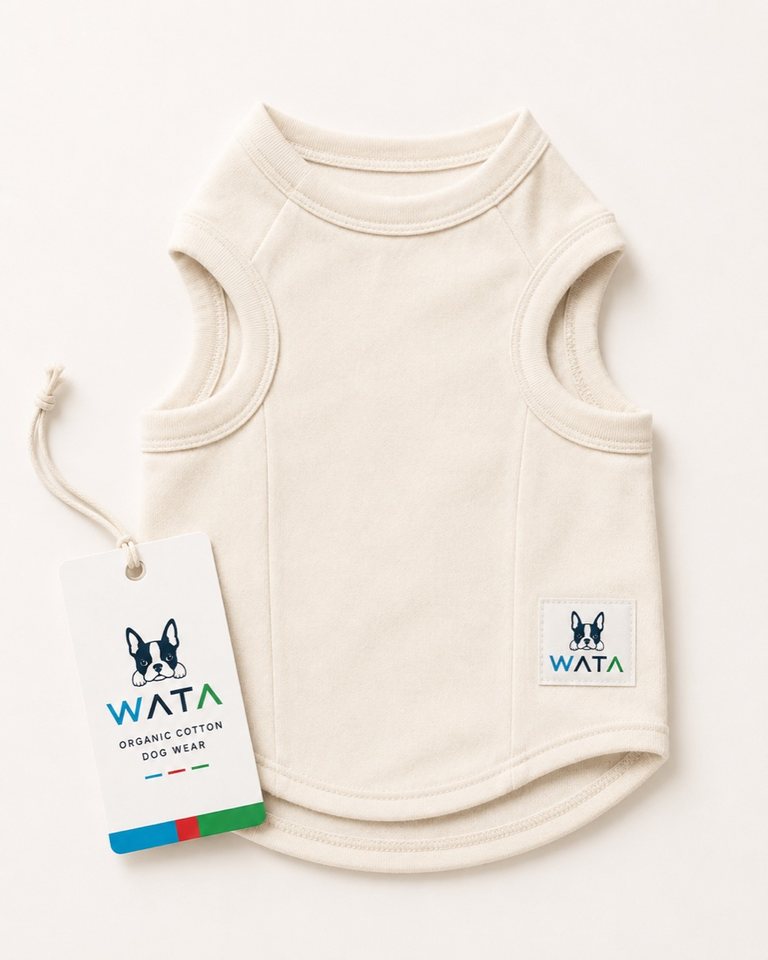 WATAの下げ札とロゴタグが付いた、生成りのオーガニックコットンタンクトップ